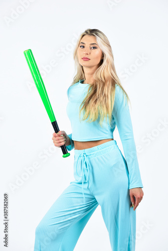 Always in good shape. woman with baseball bat. i am criminal. outdoor sport activity. full of energy. bat-and-ball games. female cricket player. girl ready batting ball. Sport and sportswear fashion