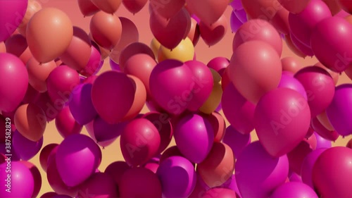 Colorful balloons rising into the in the air. Seamless loop.