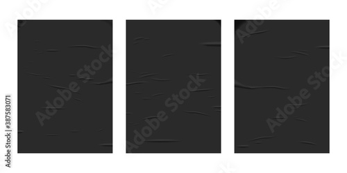 Glued black paper sheet set isolated on white background. Vector realistic crumpled posters bundle. Wet greased wrinkles blank template texture. Empty advertising column mockup for creative design.