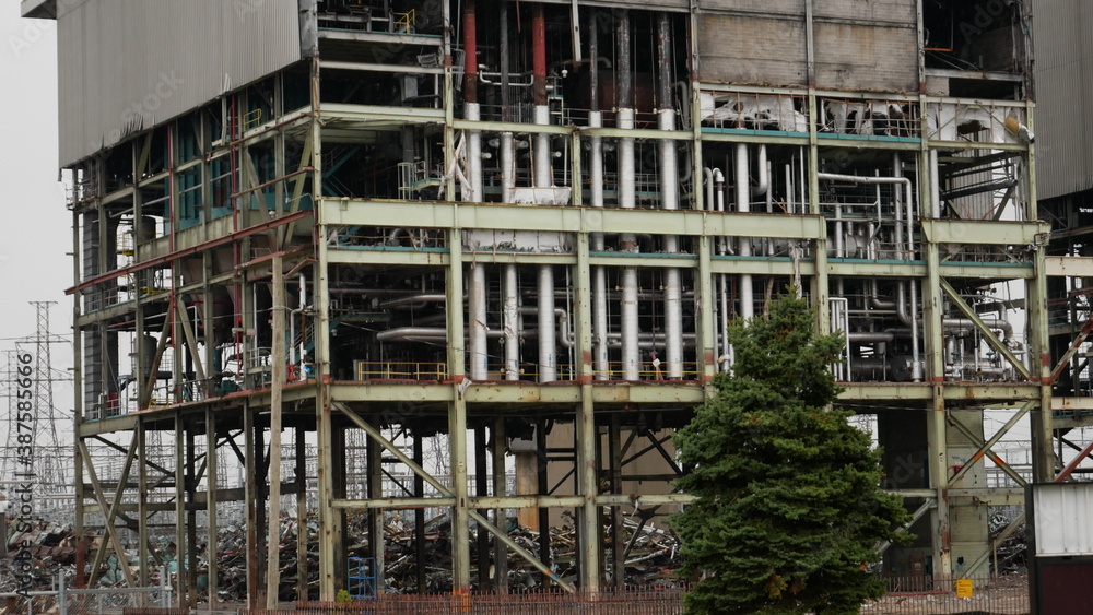 Industrial powerplant structure being demolished and in decay