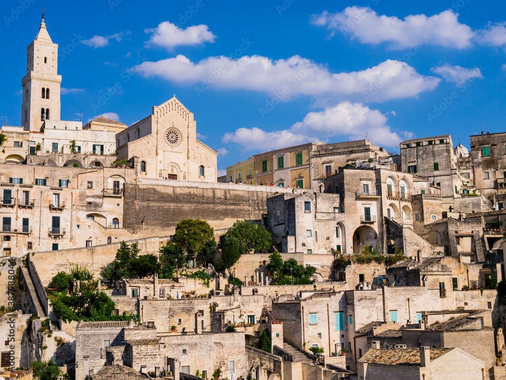 Picturesque view of Sasso Barisano district and its characteristic cave dwellings in the ancient town of Matera, Basilicata region, southern Italy
