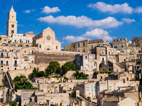 Picturesque view of Sasso Barisano district and its characteristic cave dwellings in the ancient town of Matera, Basilicata region, southern Italy 