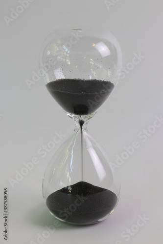 hourglass on white background photo