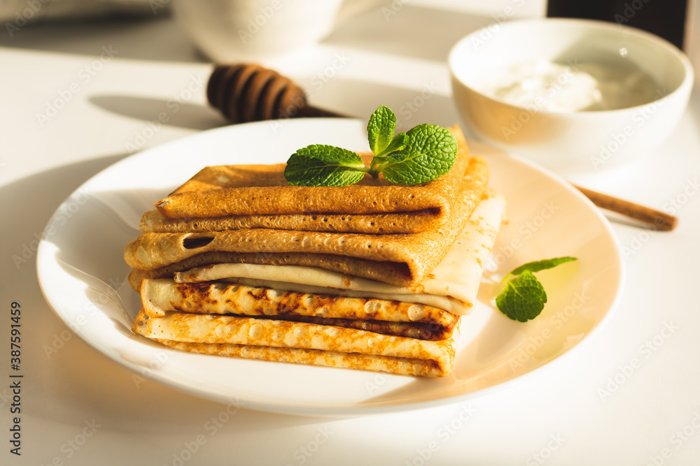 A stack of freshly baked pancakes for breakfast A stack of freshly baked pancakes for breakfast