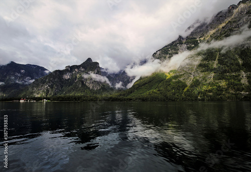 Scenic view of the Königssee and mountains surrounded by clouds in the Nationalpark Berchtesgaden, Germany shot with a wide-angle lens