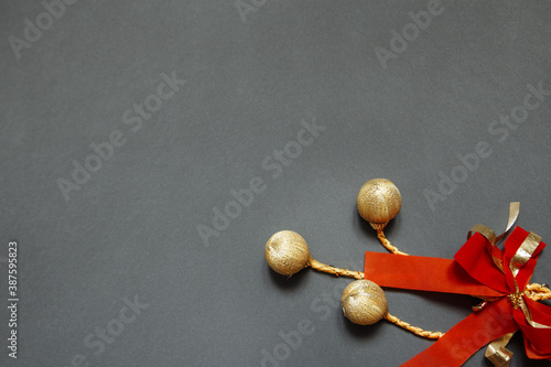 Christmas gray background with ribbon and toys