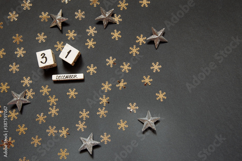 Happy new year 31 December white cubes with numbers and gold stars photo