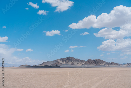 landscape that  clouds over the mountain in desert