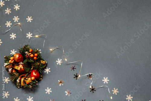 New Year's gray photophone with garland, wreath and snowflakes photo