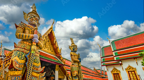 Statue of Thotsakhirithon, giant demon (Yaksha) guarding an exit at the Wat Phra Kaew Palace, also known as the Emerald Buddha Temple. Bangkok, Thailand photo