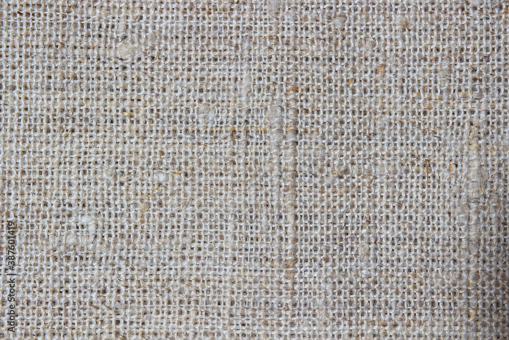 Close-up fabric texture with braided threads Close-up fabric texture with braided threads