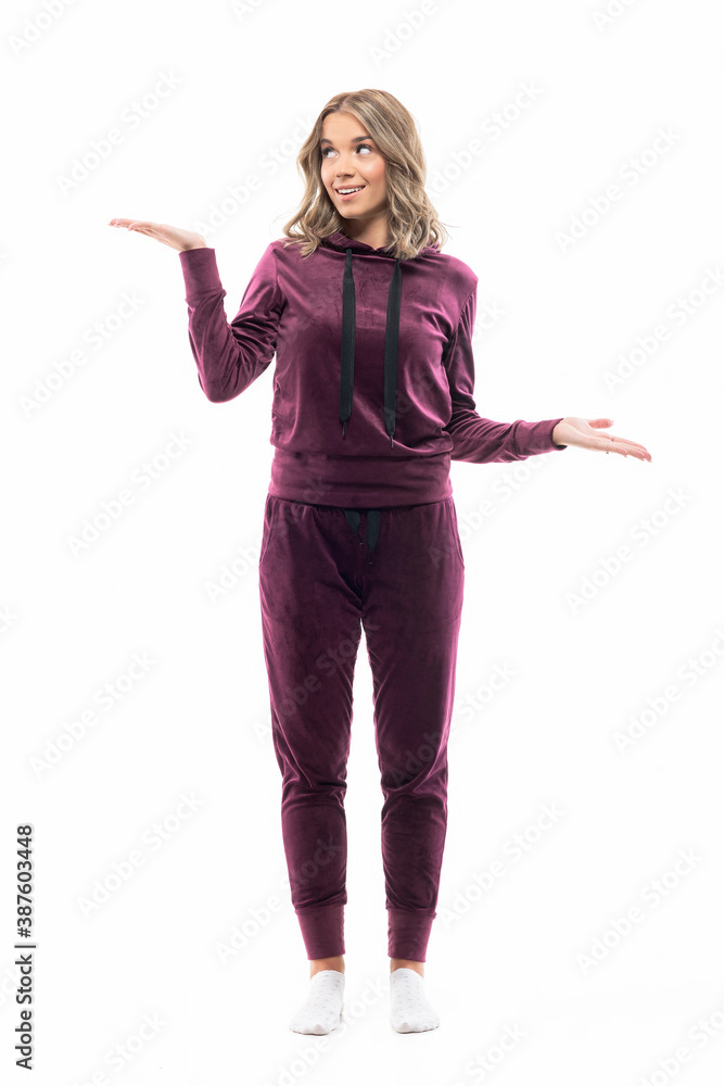 Cute hesitant casual girl having decision or choice with open hands looking up. Full length isolated on white background. Cute hesitant casual girl having decision or choice with open hands looking up. Full length isolated on white background.