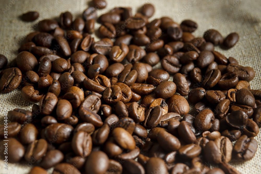 Sprinkled coffee beans on the table Sprinkled coffee beans on the table