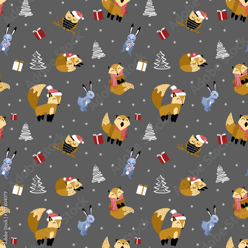 Fototapeta Naklejka Na Ścianę i Meble -  Christmas seamless pattern with cute cartoon woodland animals. Foxes, owls and rabbits on gray background. Vector illustration.