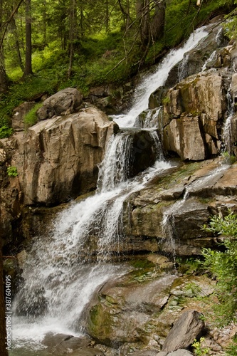 waterfall in the mountains, motion blur.