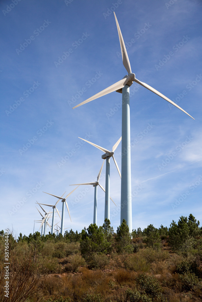 A wind turbine a device that converts the wind's kinetic energy into electrical energy