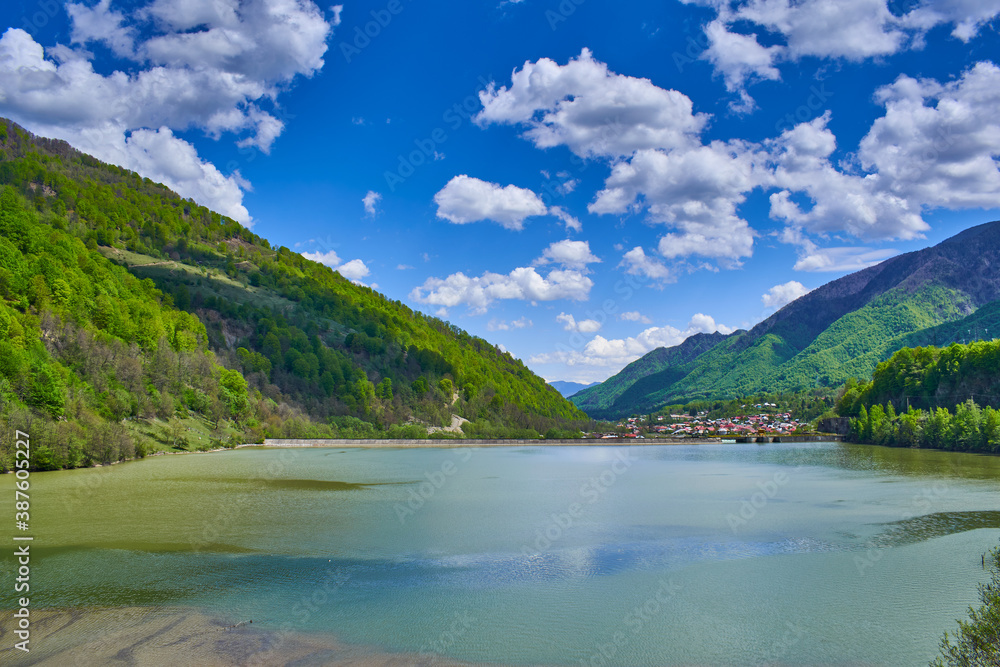 lake Malaia with mountains and blue sky and clouds