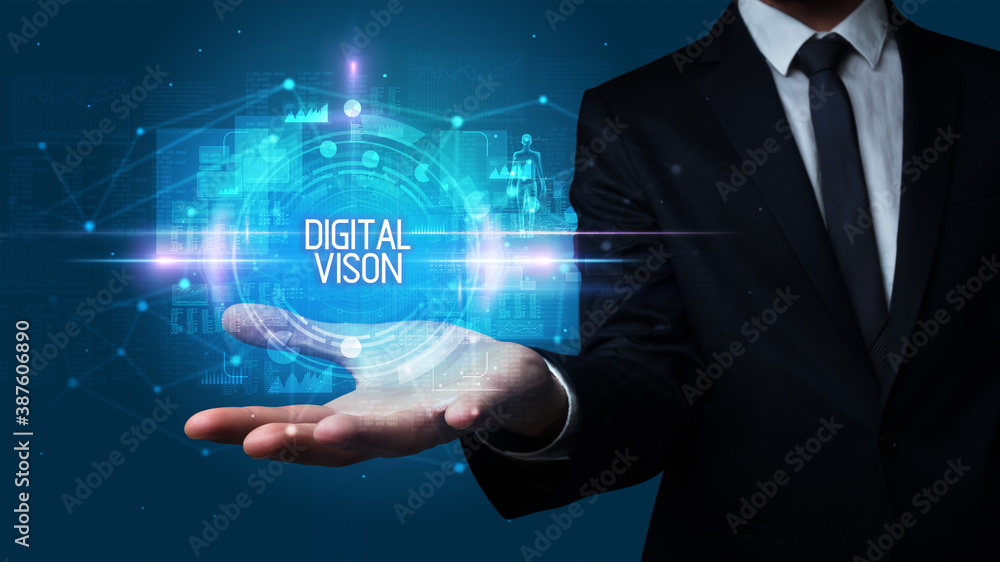 Man hand holding DIGITAL VISON inscription, technology concept Man hand holding DIGITAL VISON inscription, technology concept