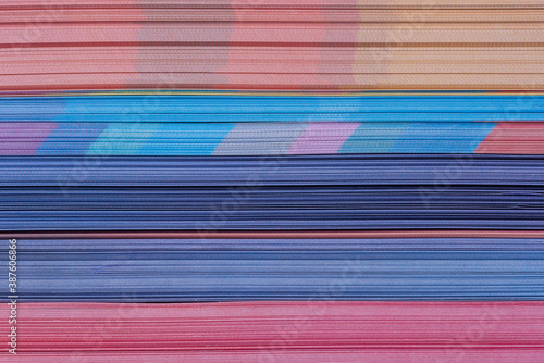 Stack of colorful paper background 