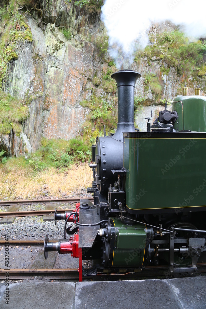 Naklejka premium The front of an old steam engine on the Talyllyn Railway, Gwynedd, Wales, UK.