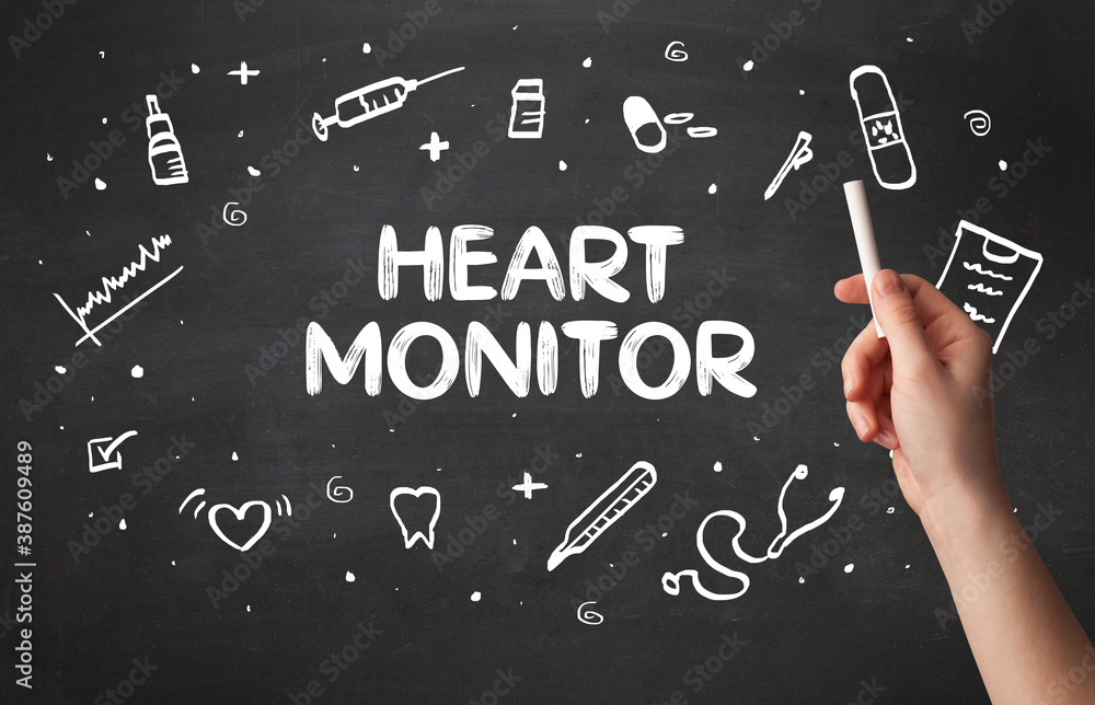 Hand drawing HEART MONITOR inscription with white chalk on blackboard, medical concept Hand drawing HEART MONITOR inscription with white chalk on blackboard, medical concept