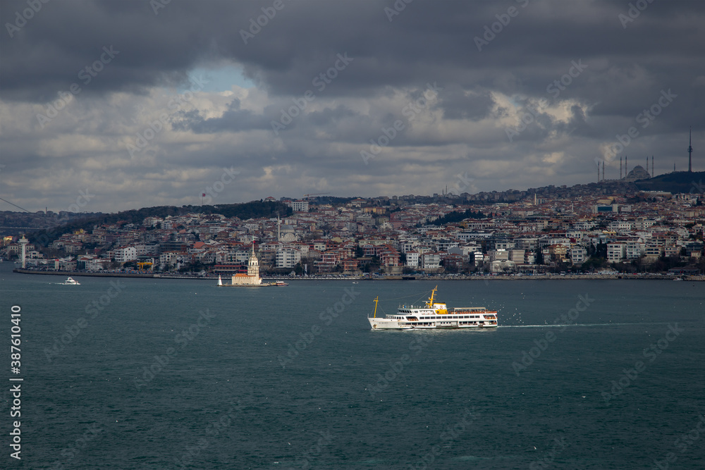 Ship in Bosphorus in Cloudy Sky
