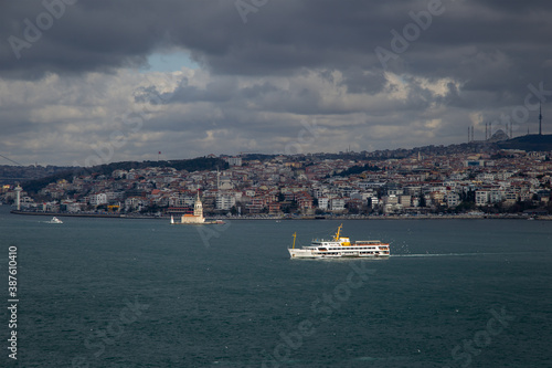 Ship in Bosphorus in Cloudy Sky