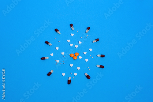 White and colored medicines in the form of figurines.