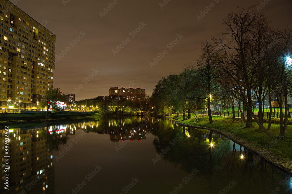 City pond in the autumn night.