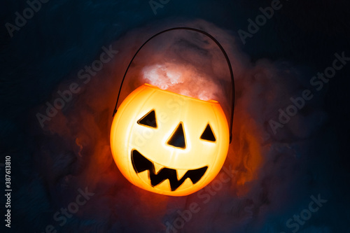 horror spooky funny ghost in halloween on holiday season greeting night celebration party with toy prop decoration and trick or treat autumn october festival and jack-o-lantern concept