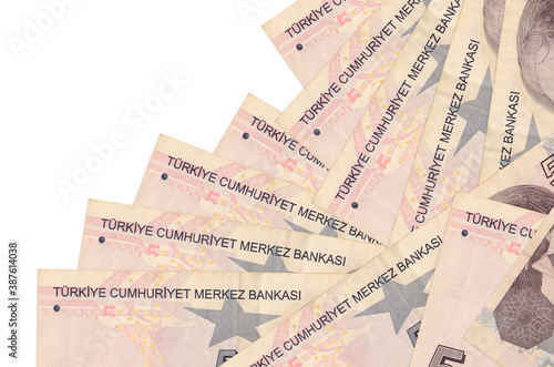 5 Turkish liras bills lies in different order isolated on white. Local banking or money making concept photo