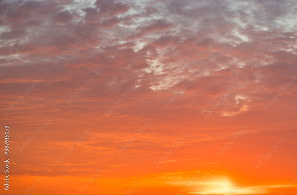 Colors of the beautiful orange sunset (sky background)