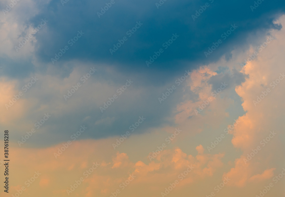 Yellow and black clouds in the sunset sky Yellow and black clouds in the sunset sky