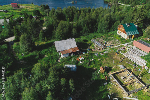 Aerial Townscape of Suburban Village Kolvica located in Northwestern Russia on the Kola Peninsula Kandalaksha Area