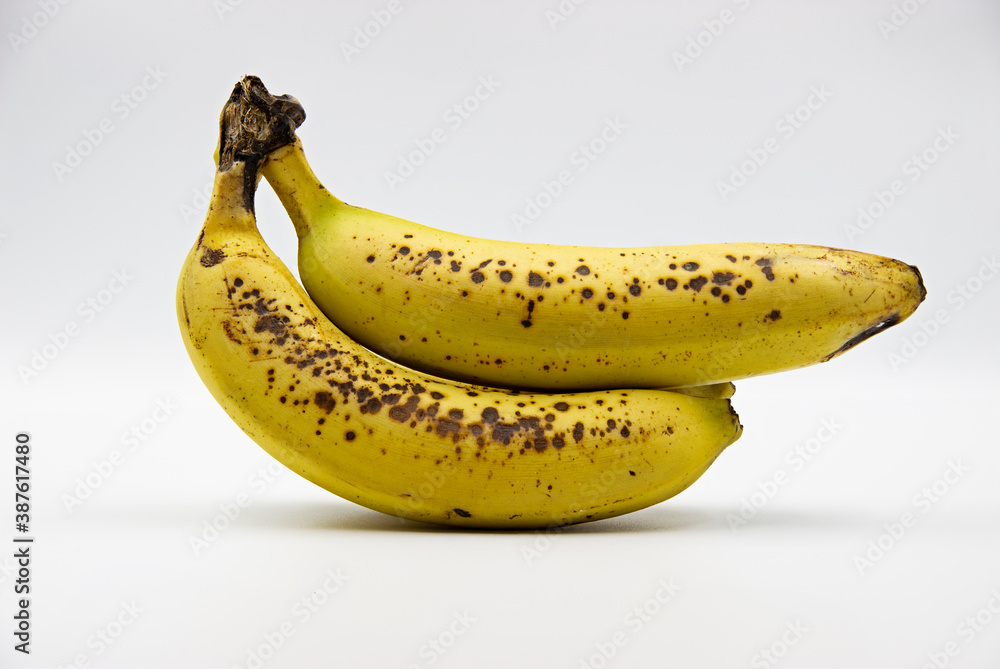 78 - Leopard-skinned bananas on a light background 78 - Leopard-skinned bananas on a light background