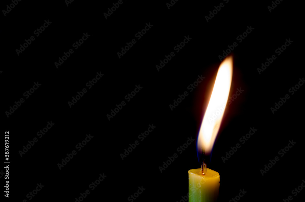 Candle flame on a black background. Candle flame on a black background.