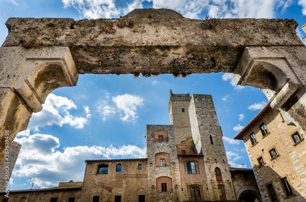 Famous San Gimignano Medieval Village and old well at Piazza della Cisterna,Tuscany, Italy,.