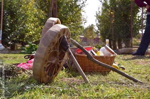 Leather drums with their sticks and basket with aromatic plants and offerings for the temazcal.