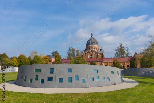 Urn walls at the central cemetery in Graz and the Serbian-Orthodox church of Saint Kyrill and Method in the background, Styria region, Austria photo