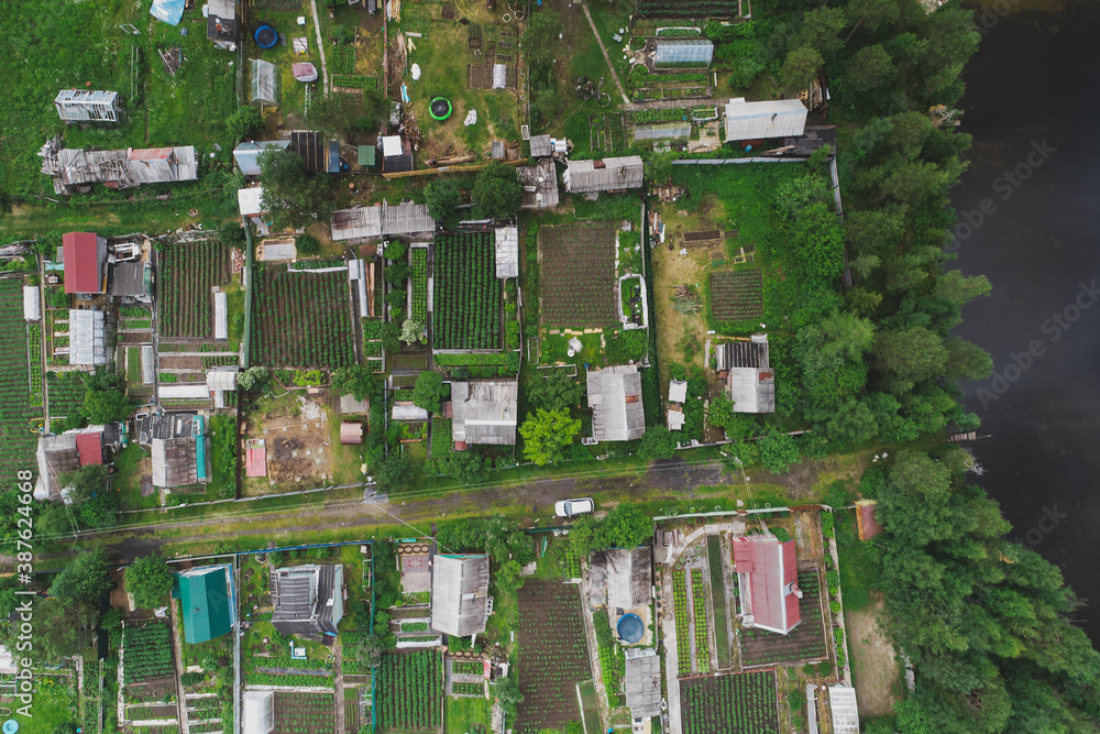 Aerial Townscape of Suburban Village Sosnoviy Bor located in Northwestern Russia on the Kola Peninsula near the town Kandalaksha Aerial Townscape of Suburban Village Sosnoviy Bor located in Northwestern Russia on the Kola Peninsula near the town Kandalaksha