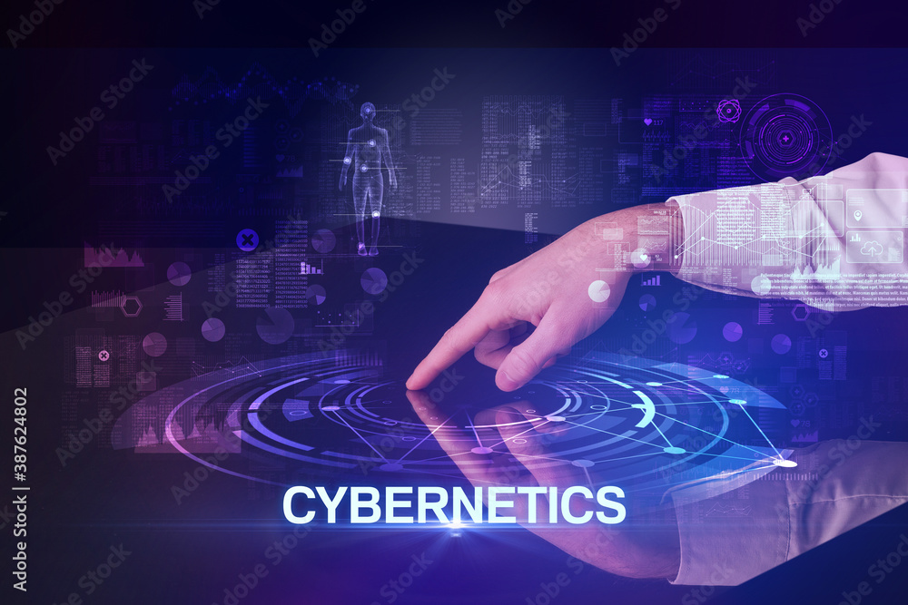 Businessman touching huge display with CYBERNETICS inscription, modern technology concept Businessman touching huge display with CYBERNETICS inscription, modern technology concept