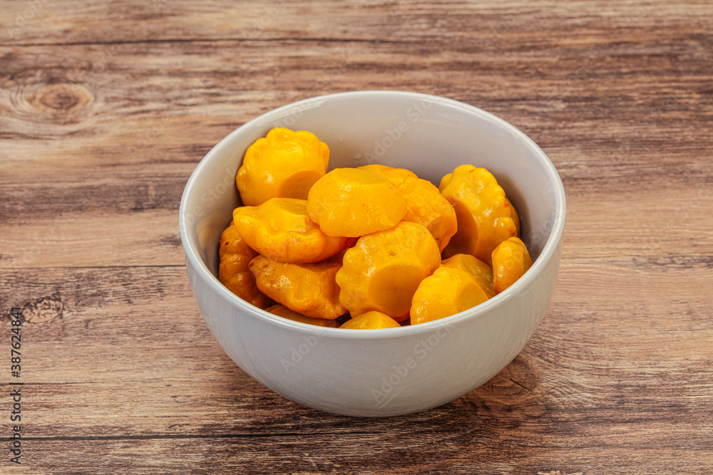 Marinated yellow patisson in the bowl Marinated yellow patisson in the bowl