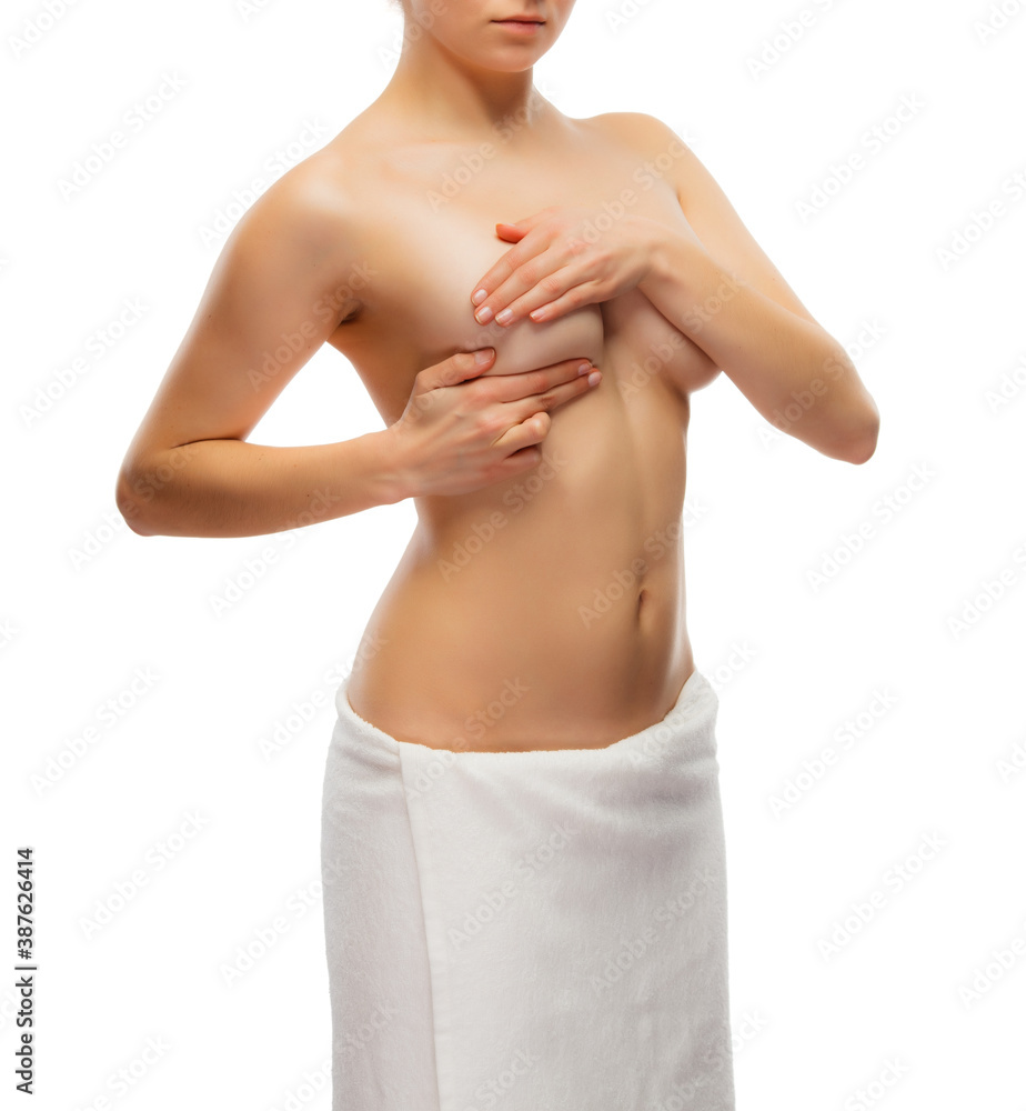 Fototapeta premium Woman examining breast isolated on white background 