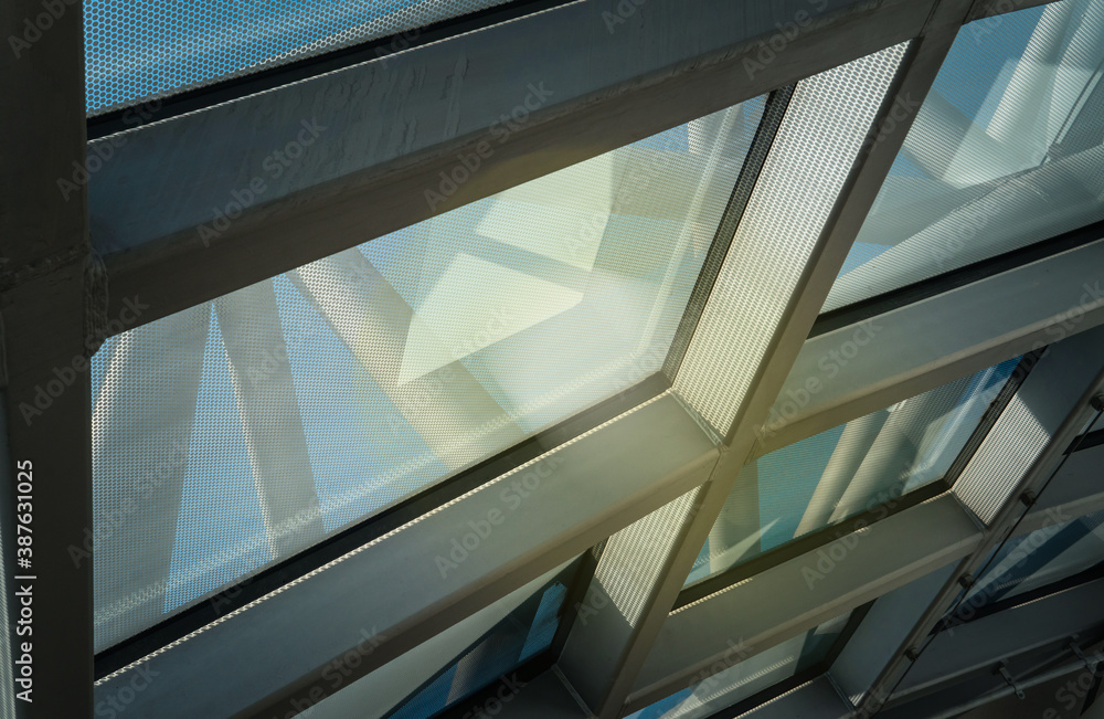 Obraz premium Film on window half the intensity of sunlight in modern construction building.