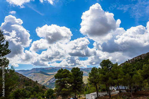 Confrides mountain´s port in the morning one day with low fog and clouds. photo