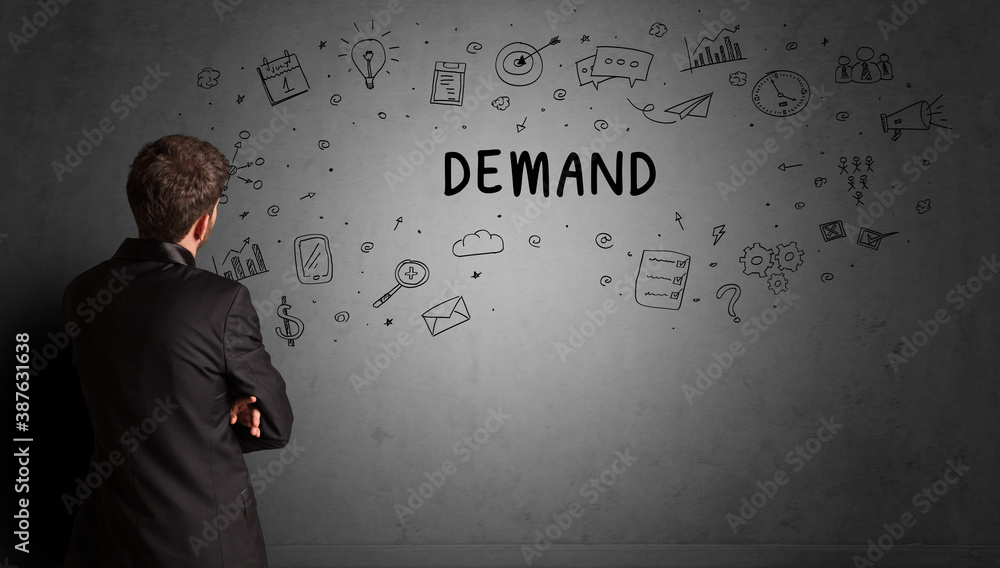 businessman drawing a creative idea sketch with DEMAND inscription, business strategy concept