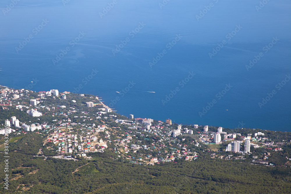 Nice view from a high mountain to the city and the sea.