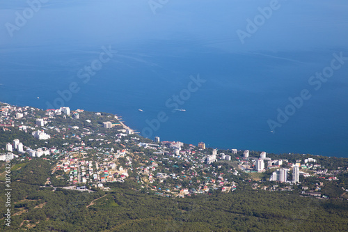 Nice view from a high mountain to the city and the sea.