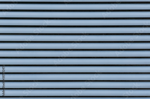 Straight fence lines. Abstract industry background. Texture from straight metal lines background.