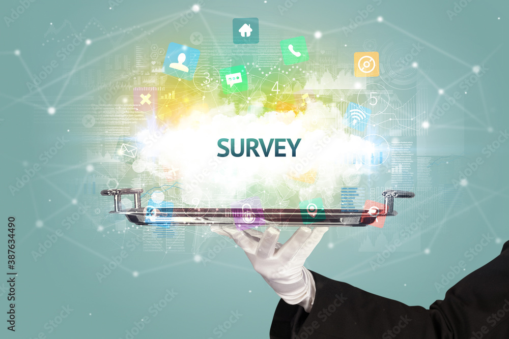 Waiter serving social networking concept with SURVEY inscription Waiter serving social networking concept with SURVEY inscription